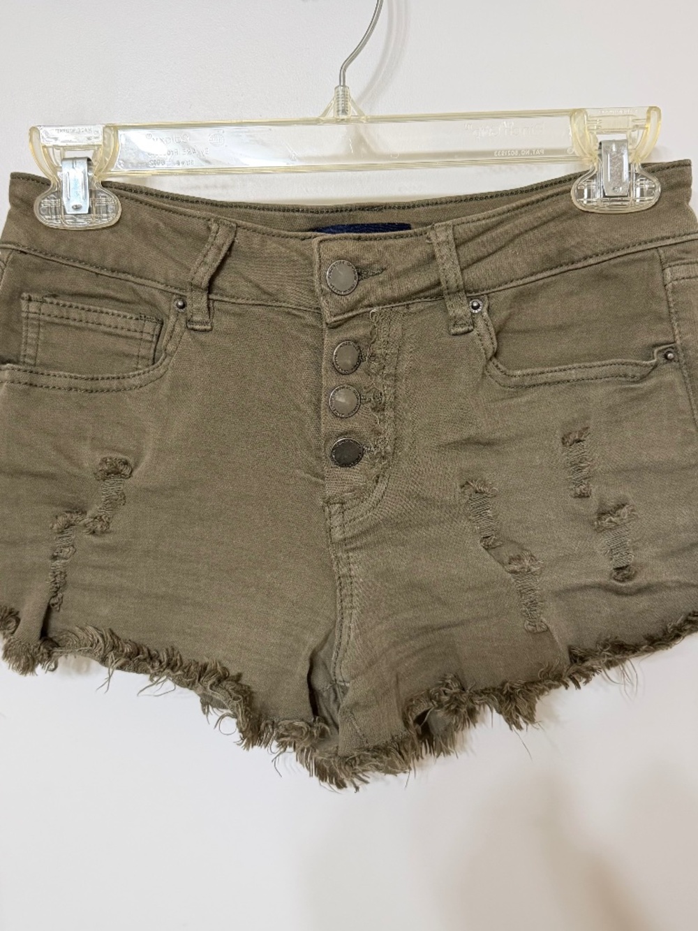 Army green ripped shorts